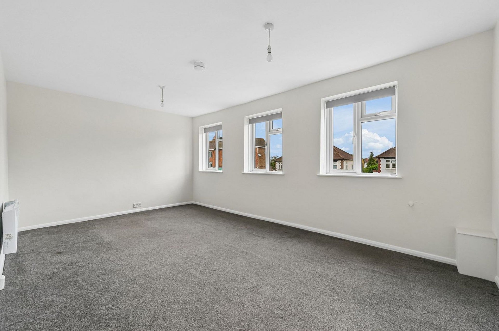Flat Stainash Parade in Borough of Spelthorne