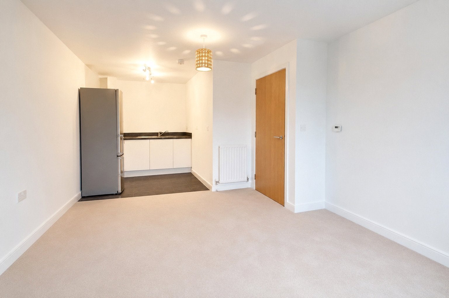 Flat Harrow Close in Borough of Runnymede