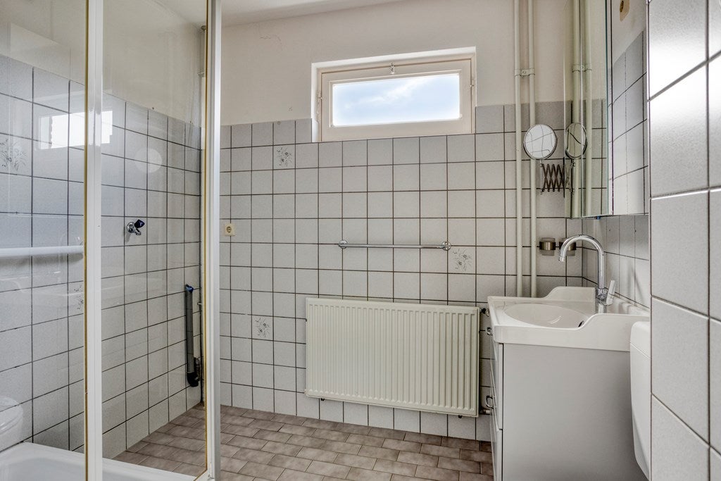 Tussenwoning te koop: Schuttersdreef 64, Heythuysen