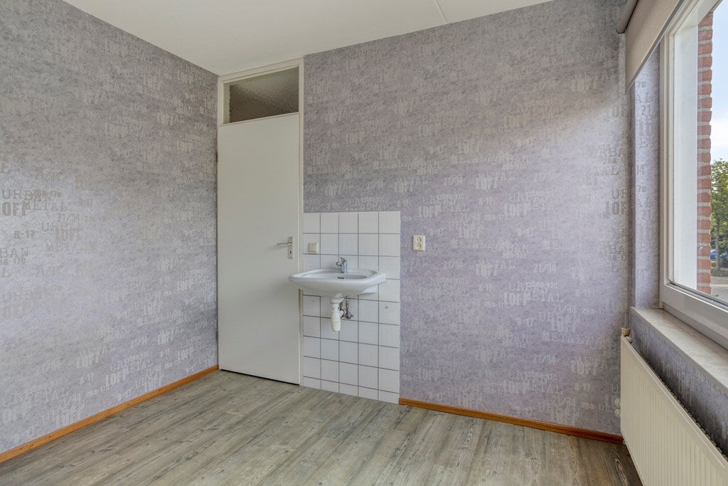 Tussenwoning te koop: Schuttersdreef 64, Heythuysen