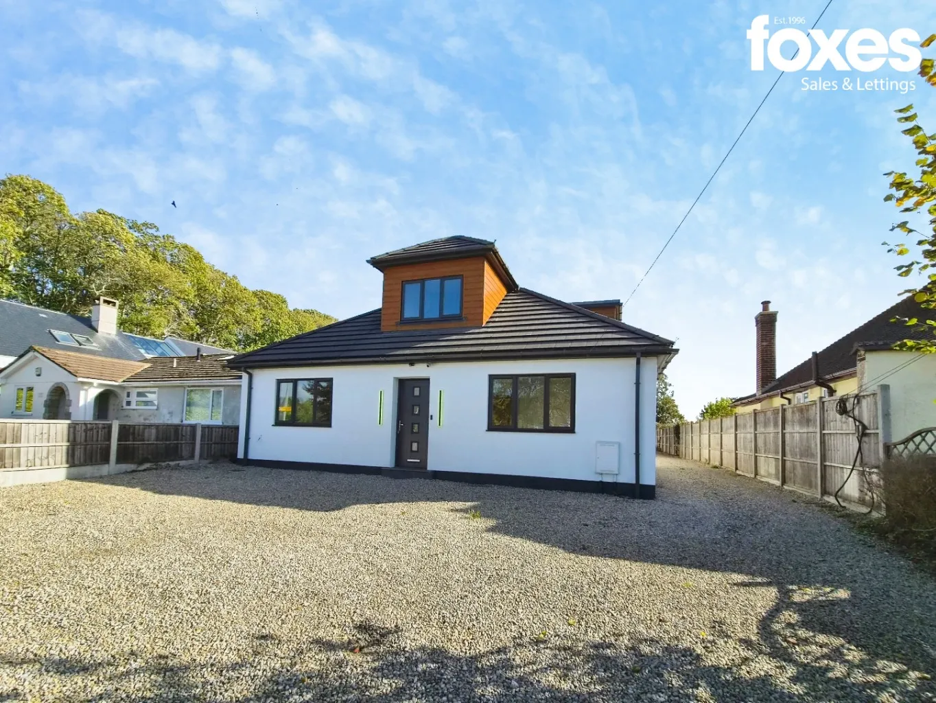 House New Road in Parley Cross