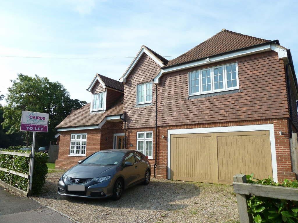 House West Farm Avenue in Mole Valley