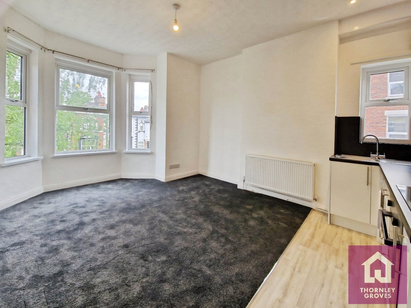 Flat Belgrave Crescent in Manchester