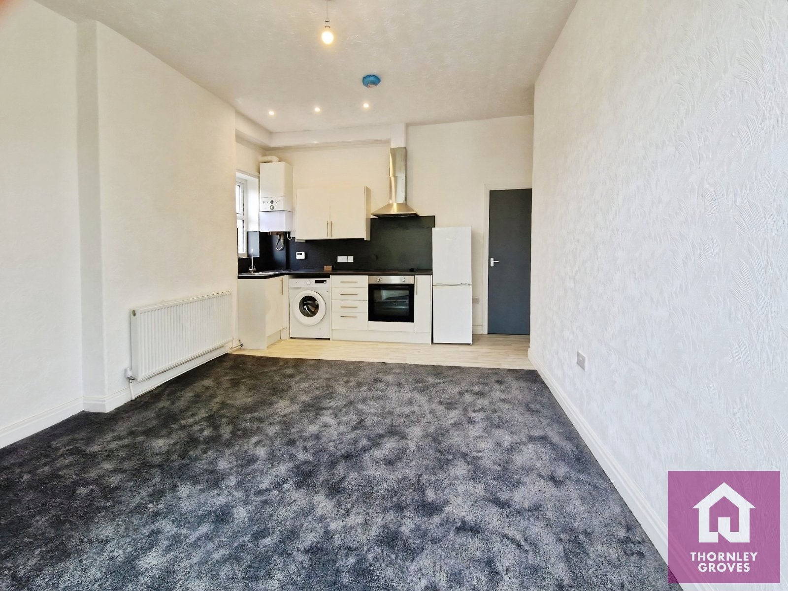 Flat Belgrave Crescent in Manchester