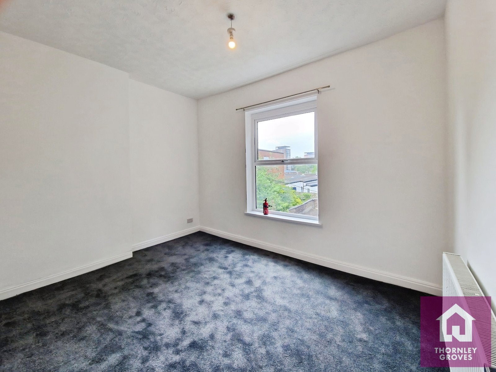 Flat Belgrave Crescent in Manchester