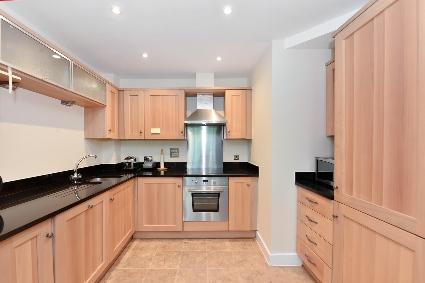 Flat Highbury Drive in Mole Valley