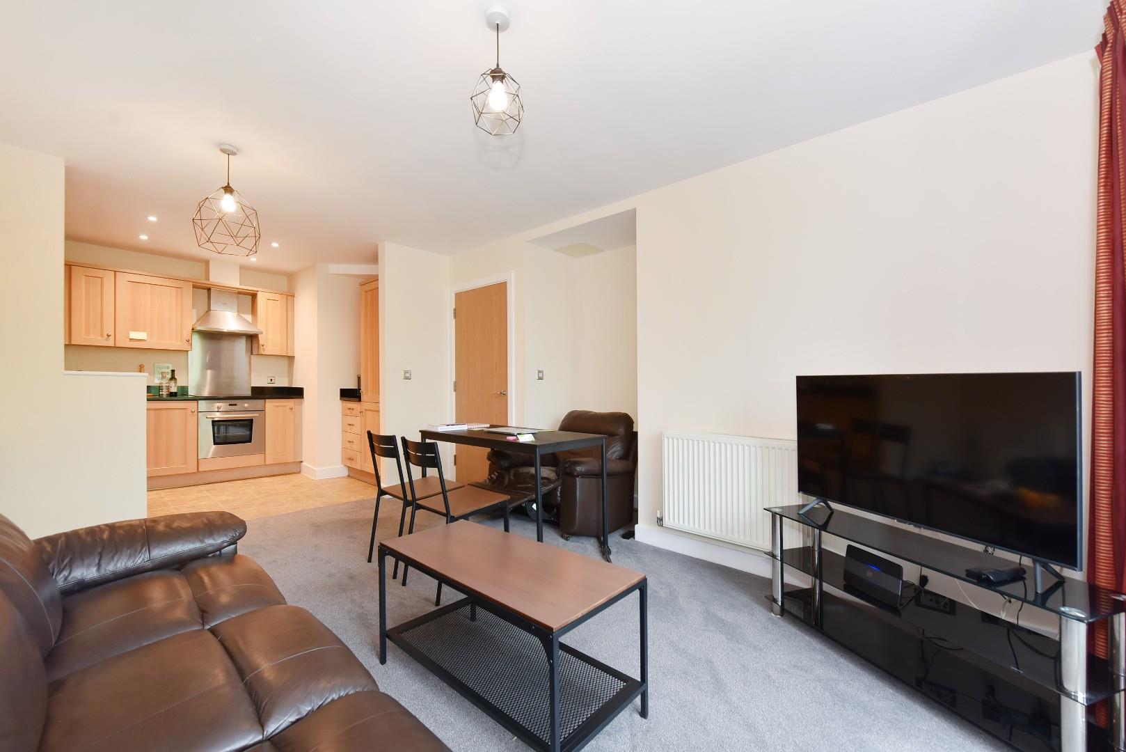 Flat Highbury Drive in Mole Valley
