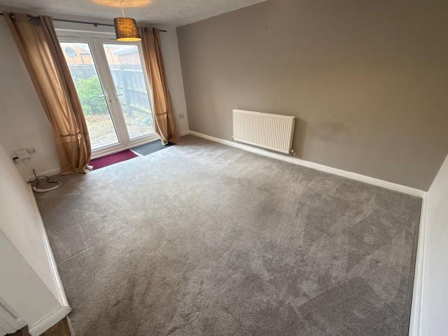 Flat Quinton Road in Quinton