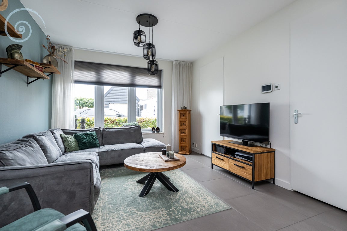 Tussenwoning te koop: Hoofdlandseweg 34, Ouddorp