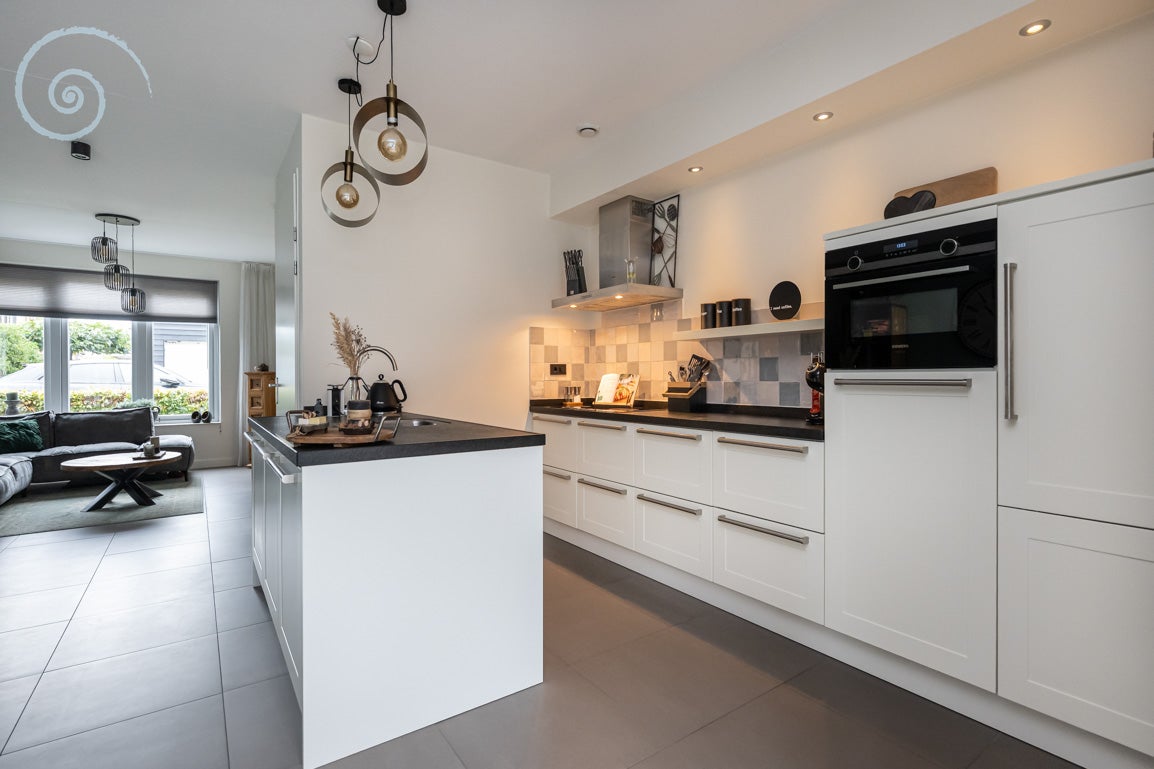 Tussenwoning te koop: Hoofdlandseweg 34, Ouddorp