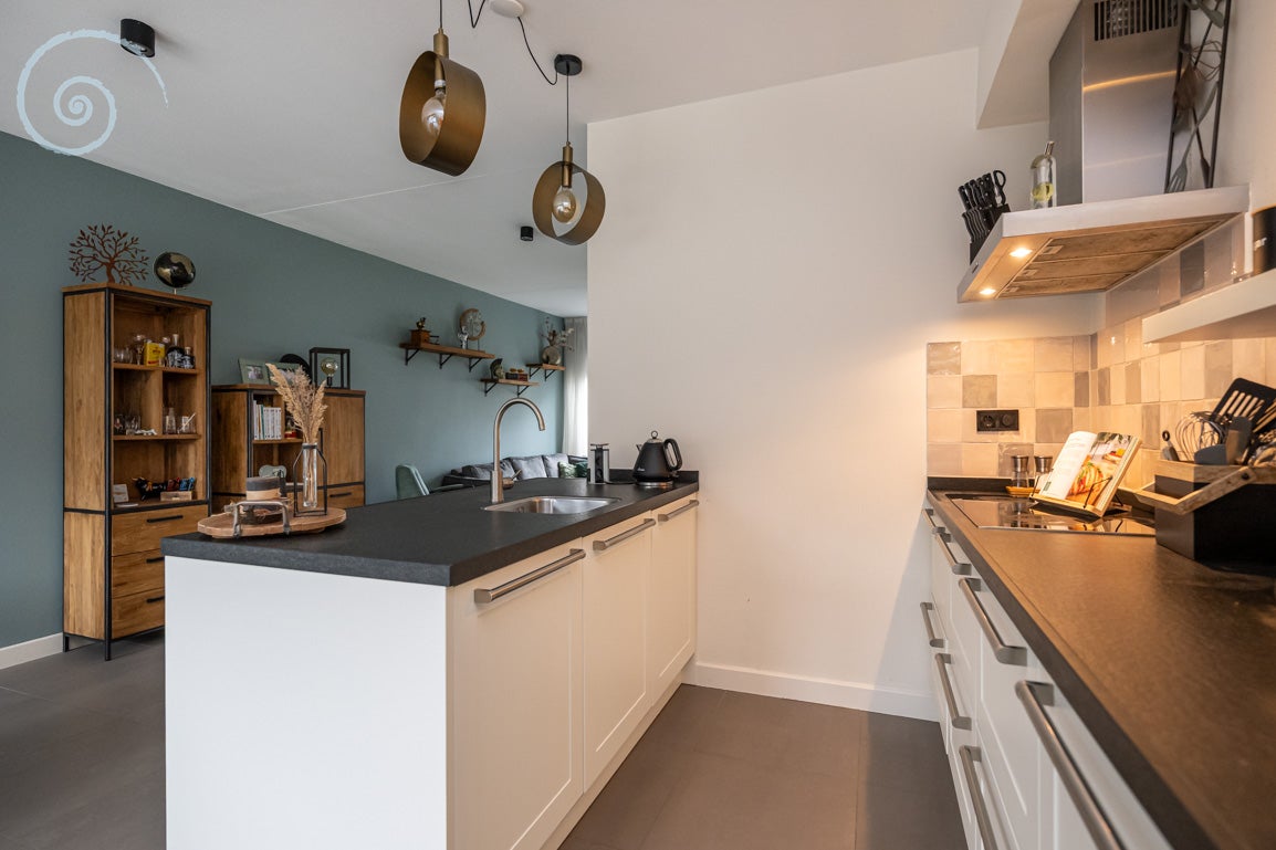 Tussenwoning te koop: Hoofdlandseweg 34, Ouddorp