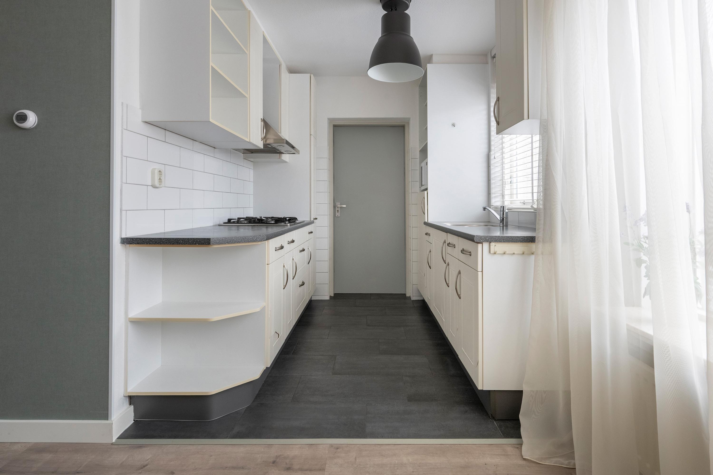 Tussenwoning te koop: Alpenkraai 51, Emmen