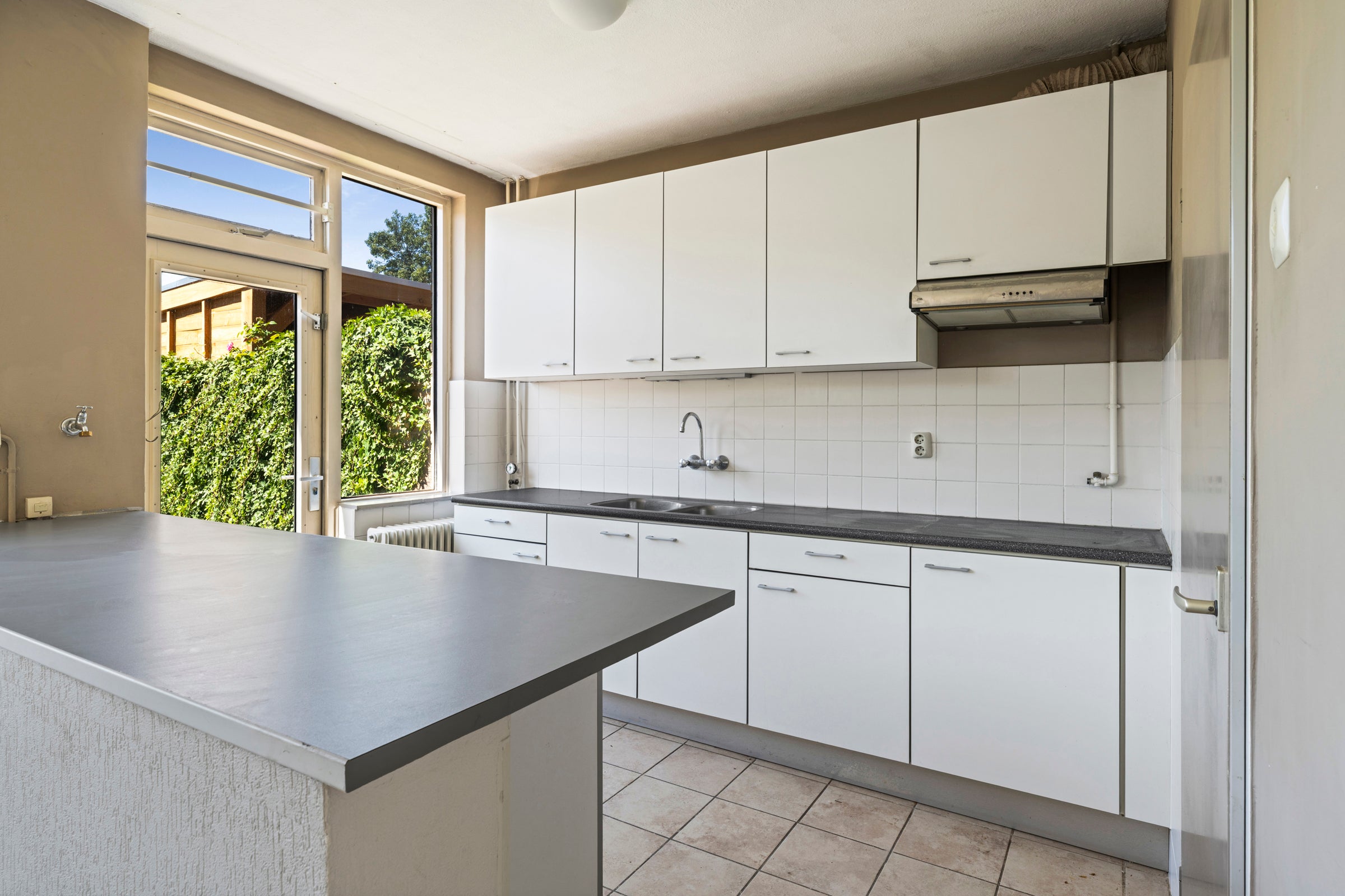 Tussenwoning te koop: Markenland 29, Etten-Leur