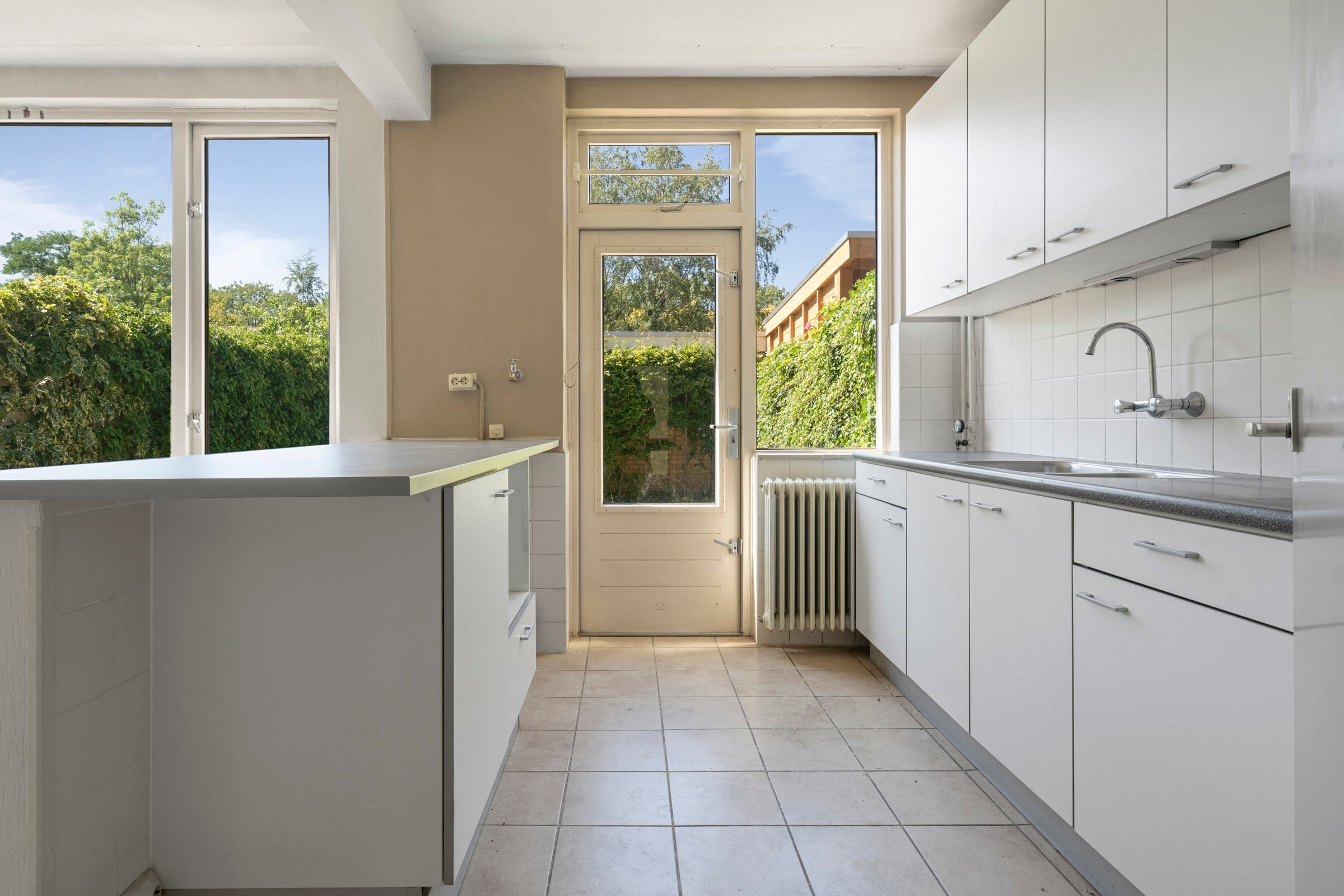 Tussenwoning te koop: Markenland 29, Etten-Leur