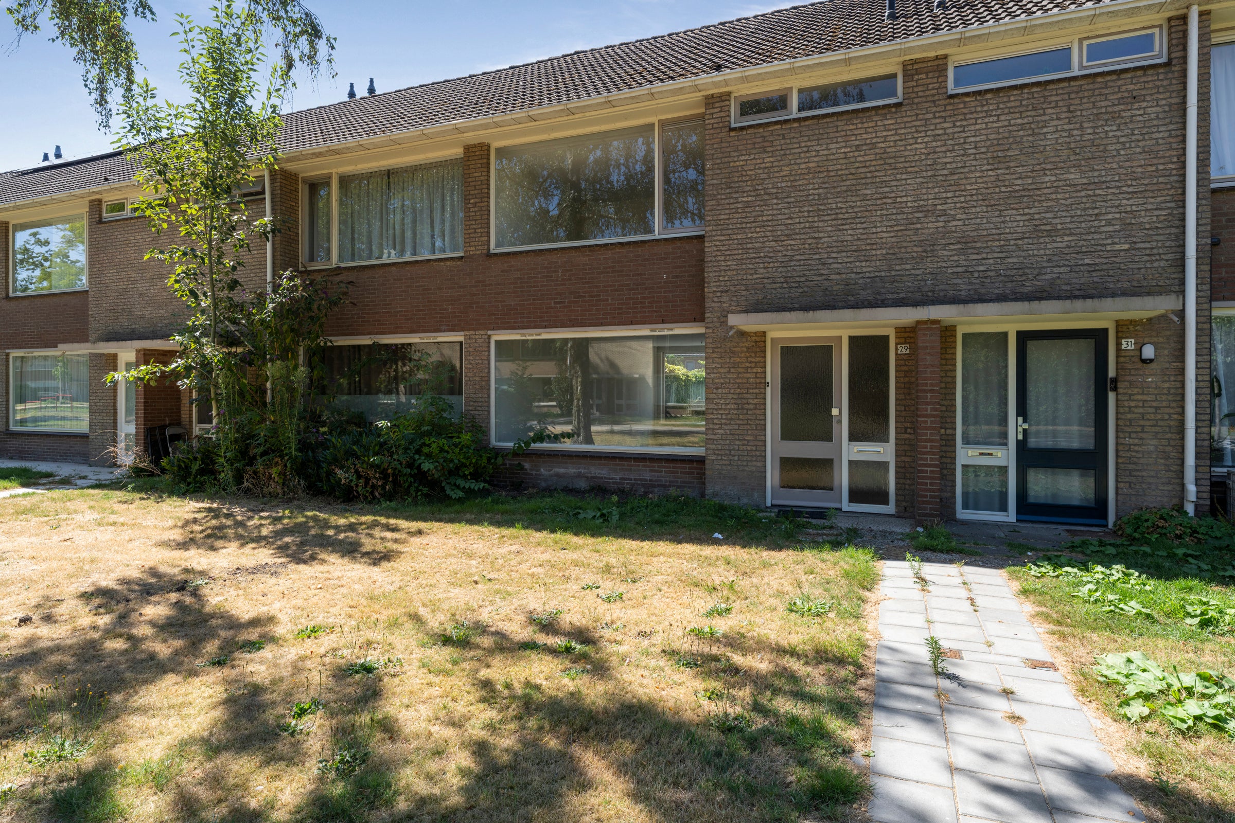 Tussenwoning te koop: Markenland 29, Etten-Leur