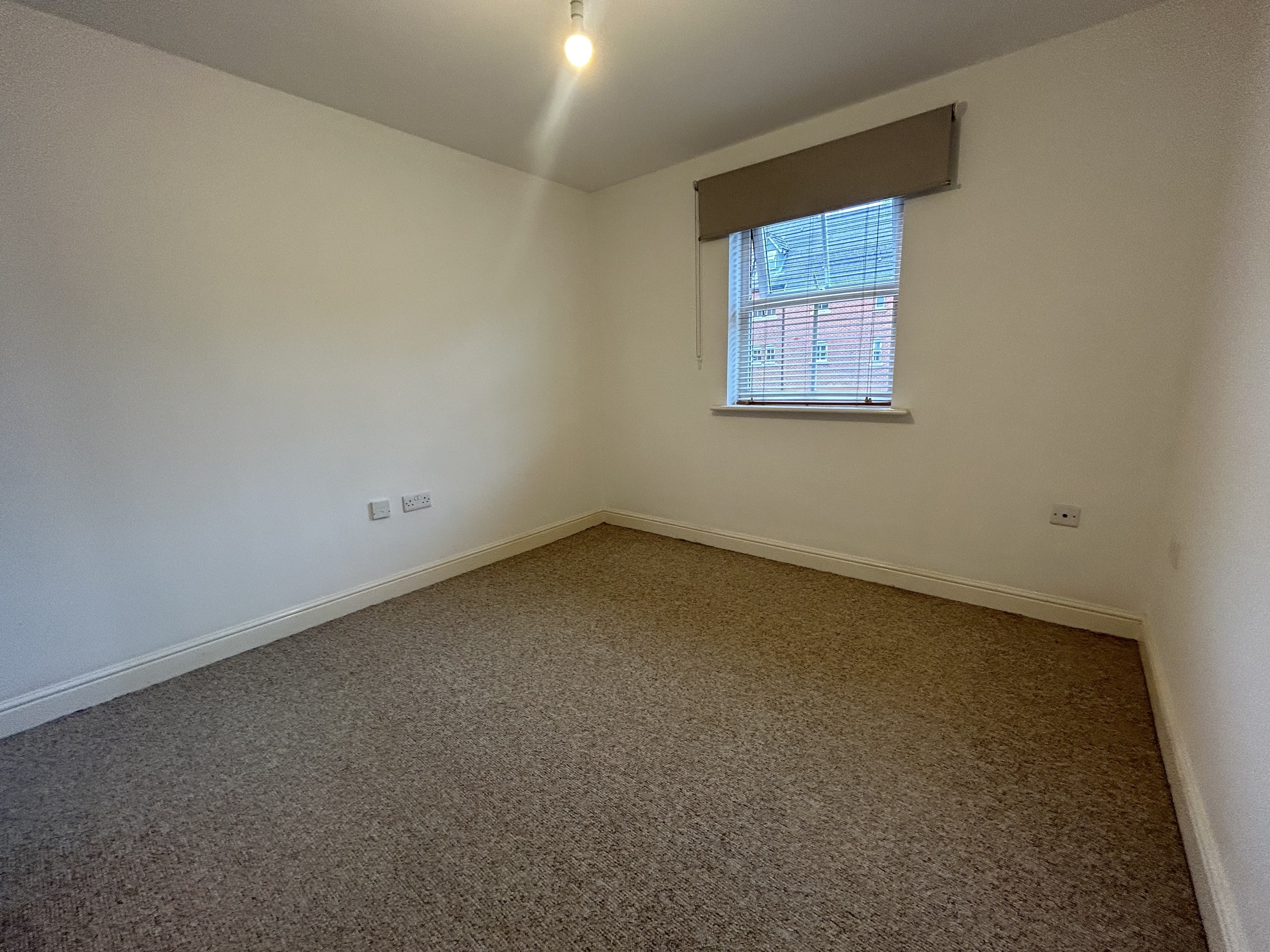 Flat Moss Hey Court in Bebington