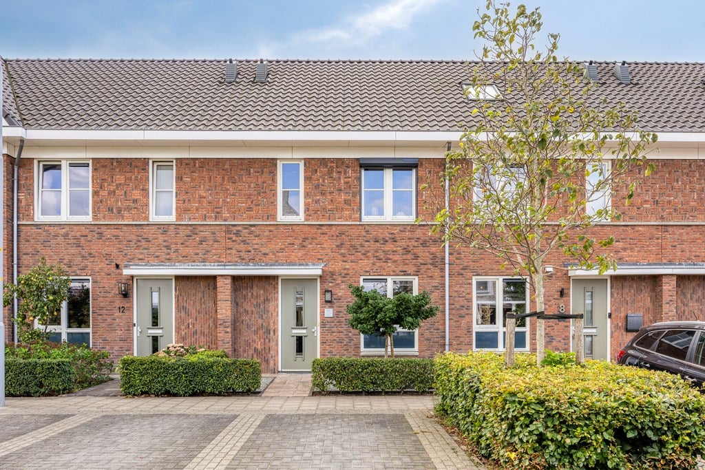 Huis Burgemeester mr W C Tackstraat 10 in Kesteren