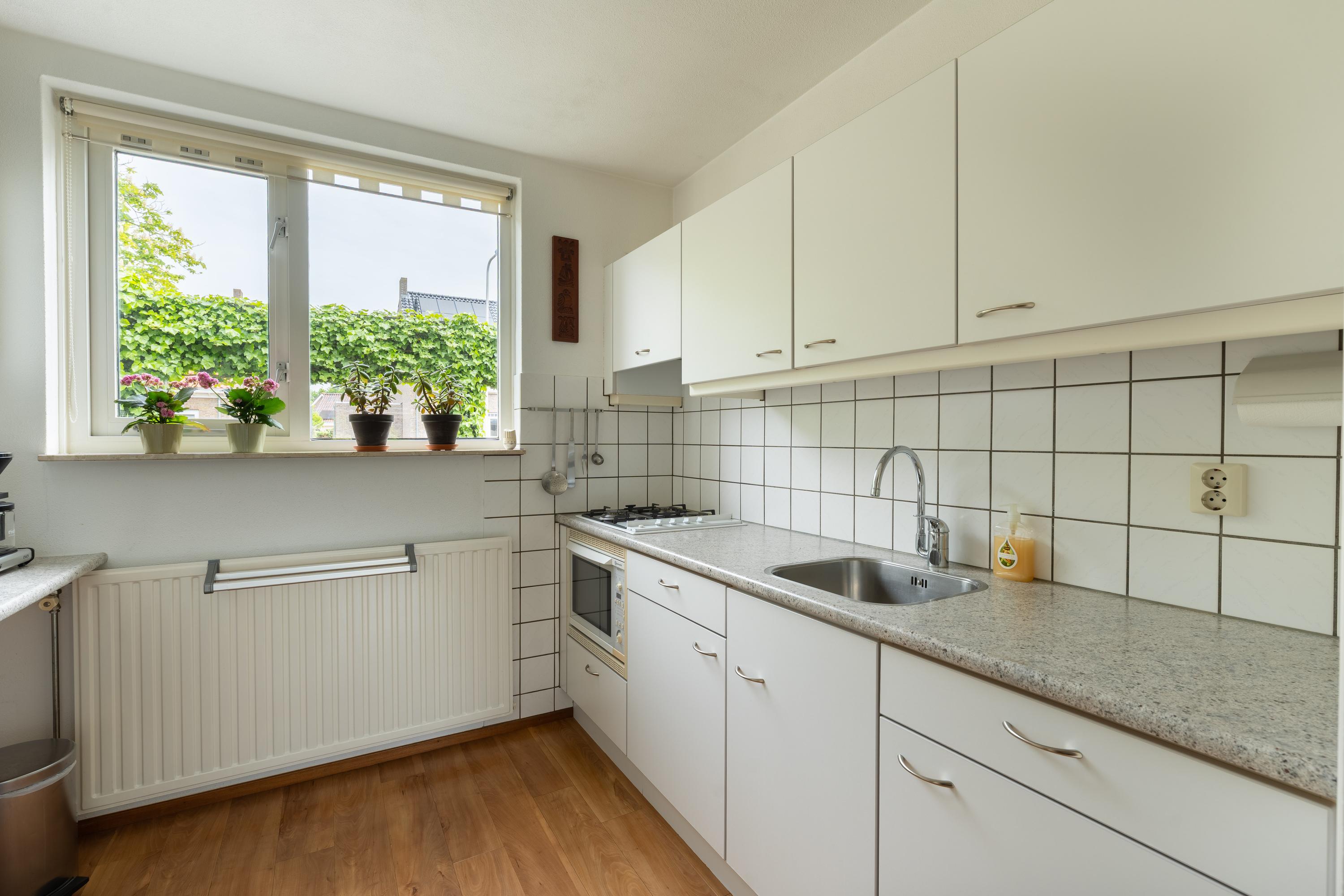 Tussenwoning te koop: Kerkhoek 8, Ouddorp
