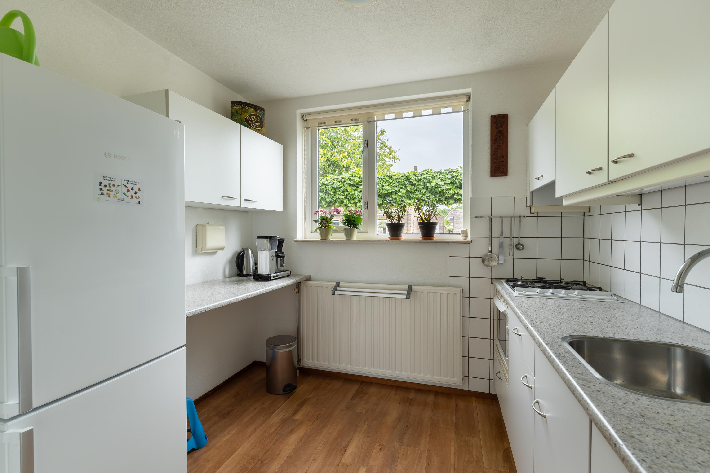 Tussenwoning te koop: Kerkhoek 8, Ouddorp