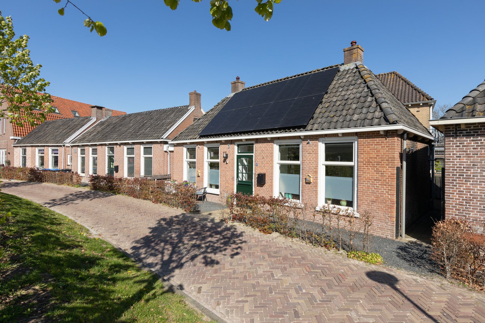 Huis Achterbuorren 13 in Scharnegoutum