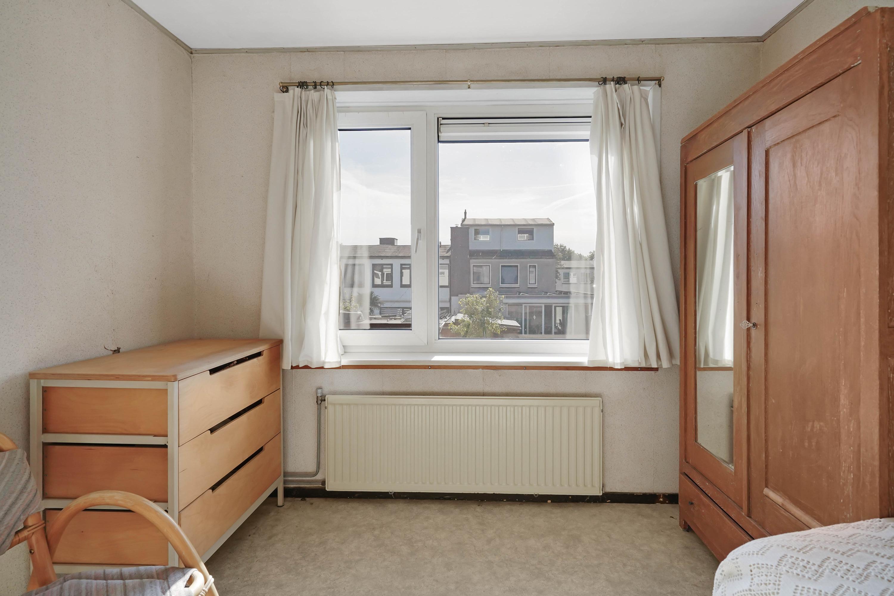 Tussenwoning te koop: Bangkasingel 46, Vlaardingen