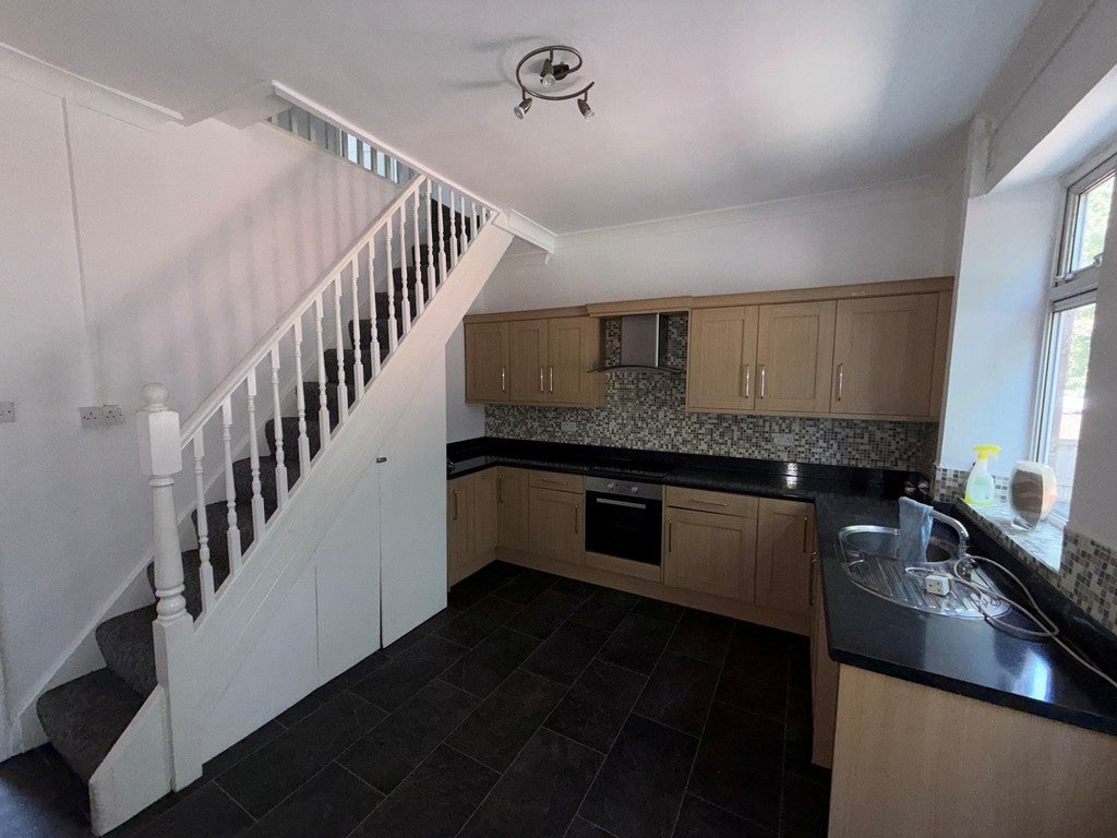 House Back Ivanhoe Street in Farnworth