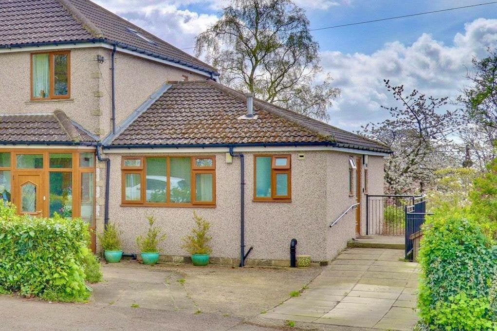 Flat Emmott Drive in Leeds