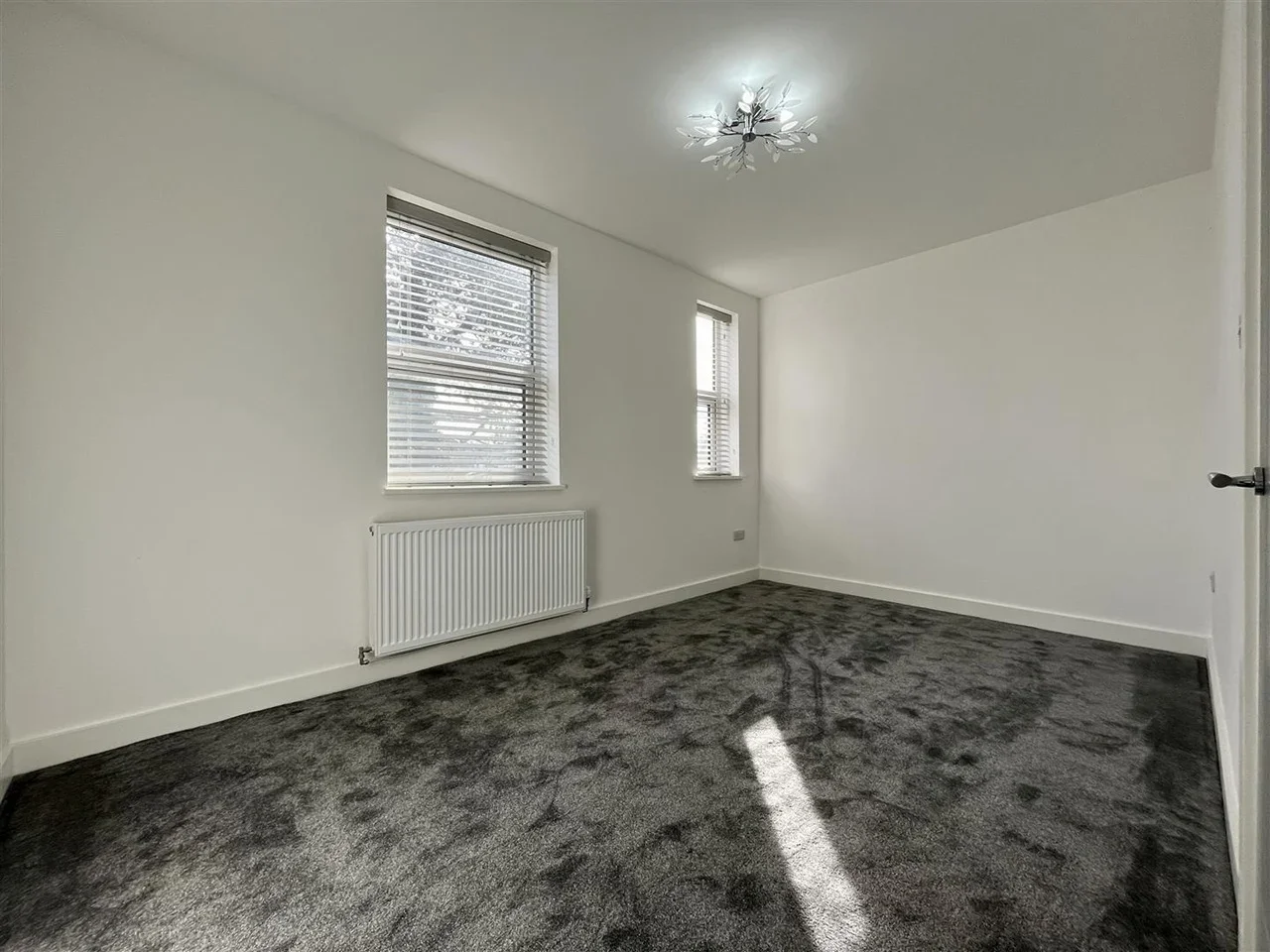 House Trenchard Drive in Manchester