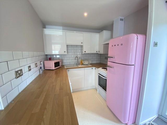 Flat Monks Crescent in Borough of Runnymede