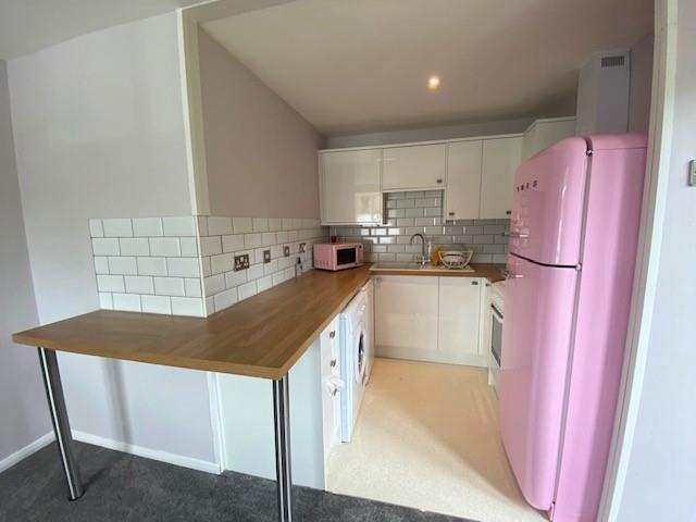 Flat Monks Crescent in Borough of Runnymede