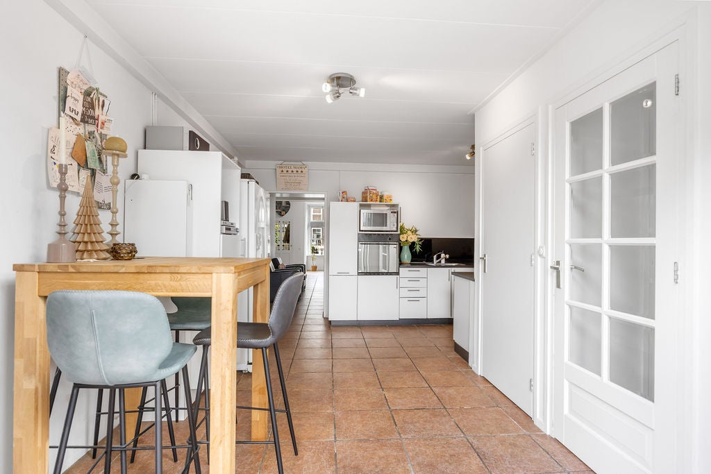 Tussenwoning te koop: Geeuwkade 48, Sneek
