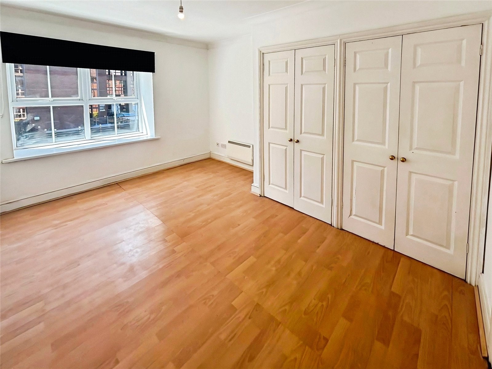 Flat Sandgate Court in Woking