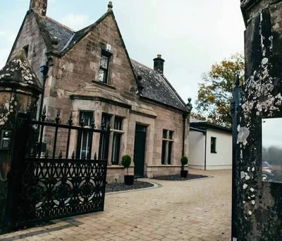 Flat School Road in Auchendennan