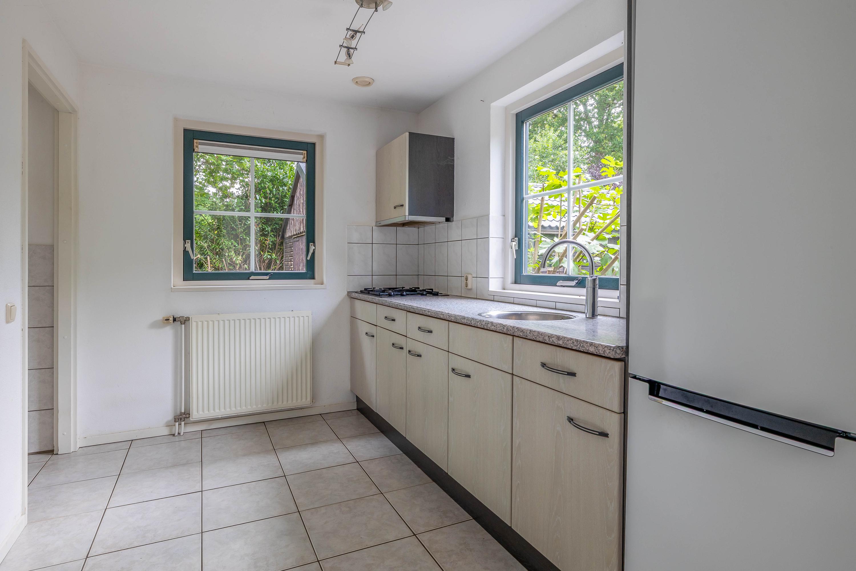 Vrijstaande woning te koop: Dorpsstraat 27, Vriescheloo