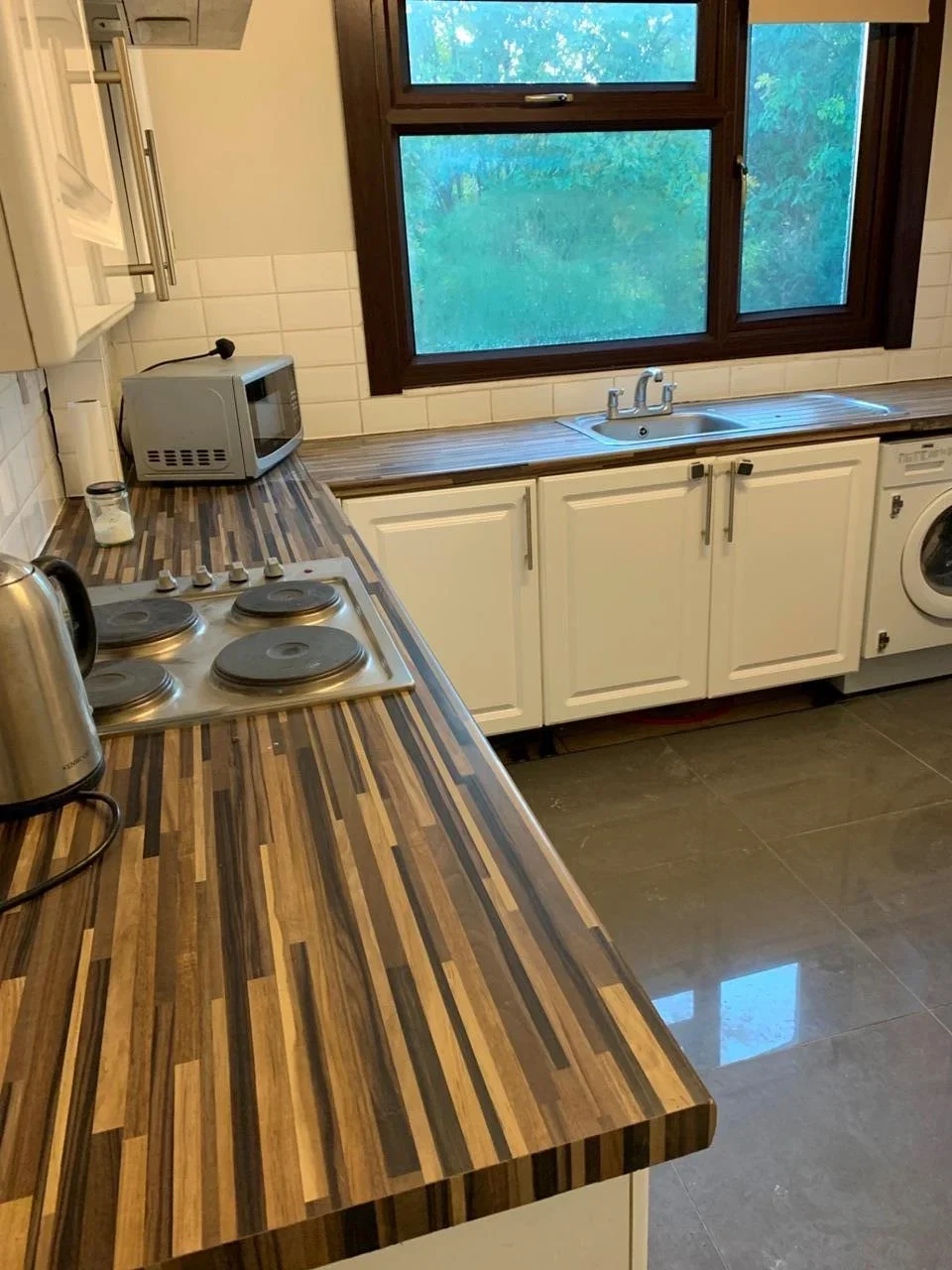 Flat Mundon Gardens in Greater London