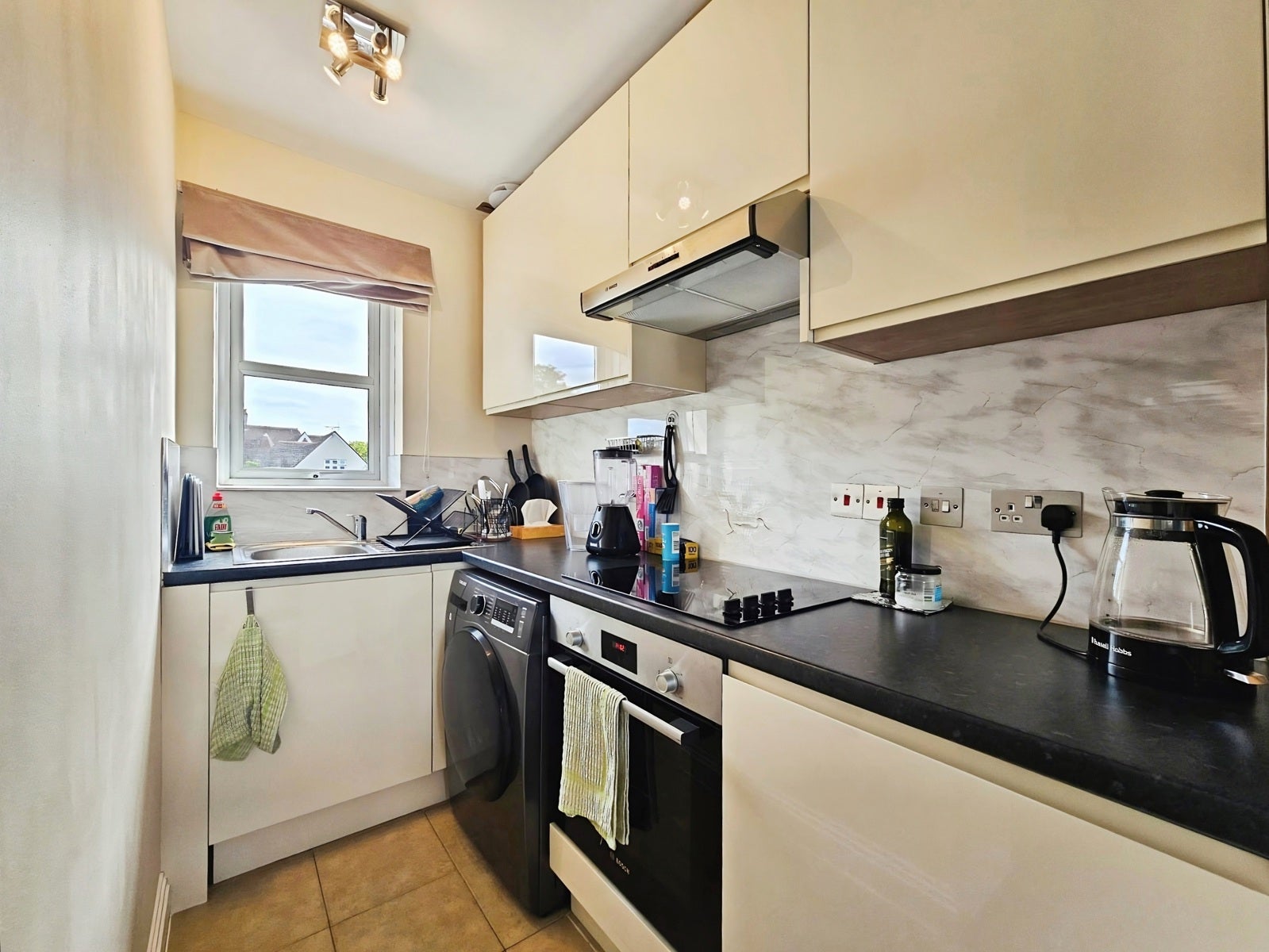 Flat Rusham Road in Borough of Runnymede