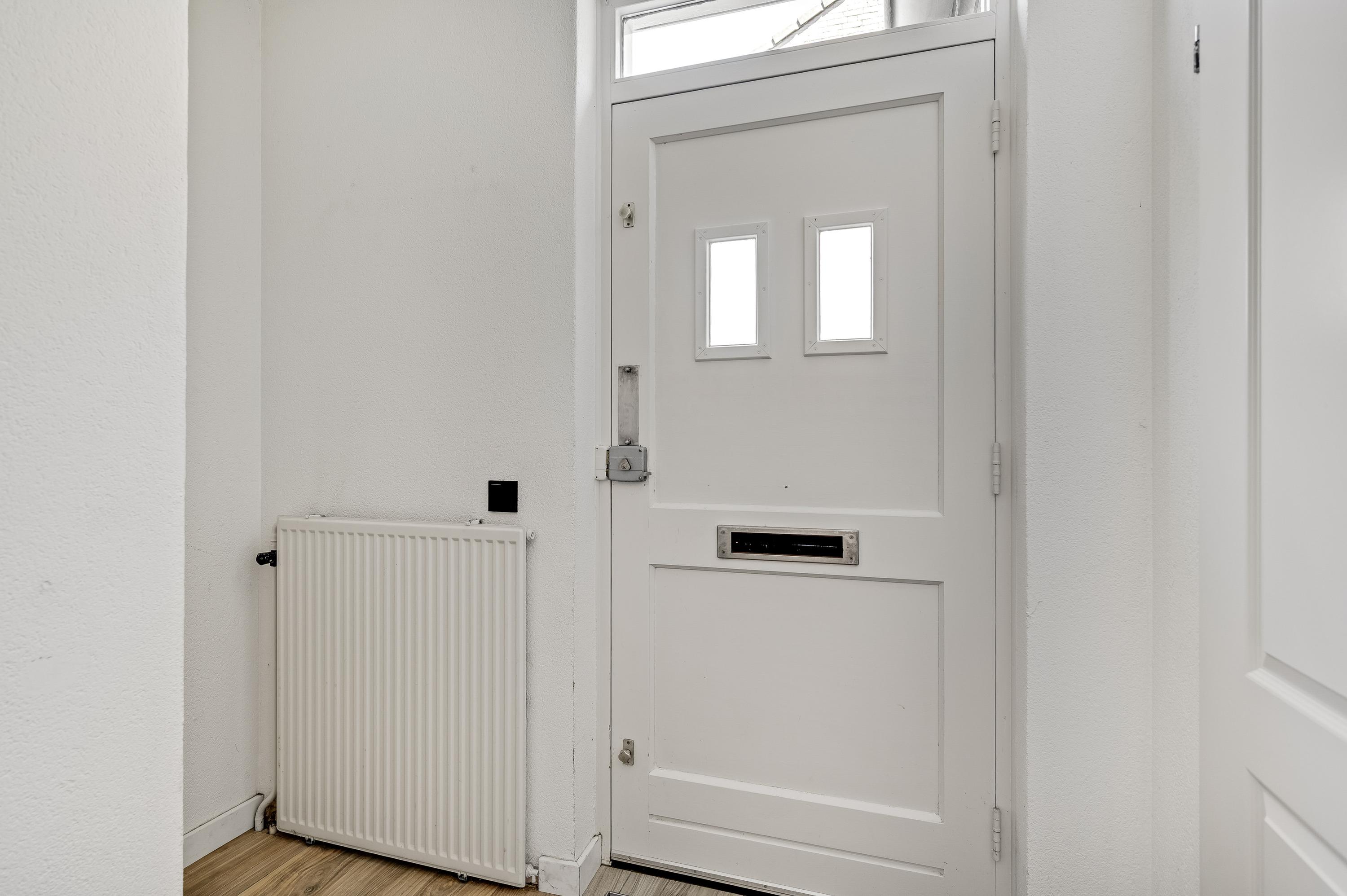 Tussenwoning te koop: Schuttersveld 25, Roggel