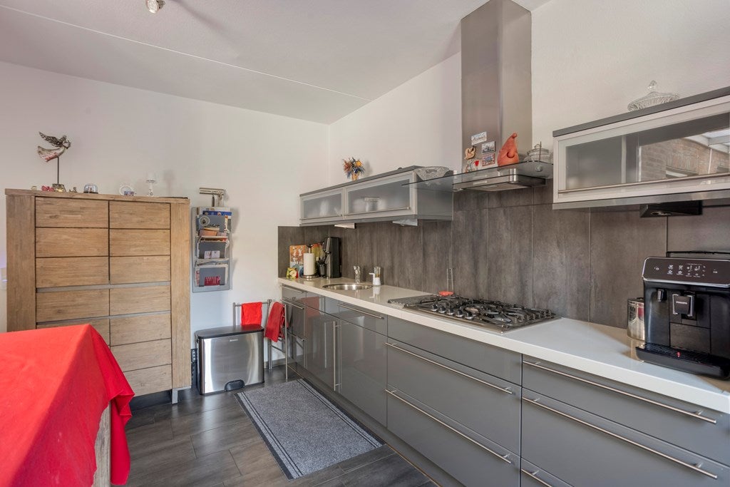 Tussenwoning te koop: Pater Hubertuscour 5, Geleen