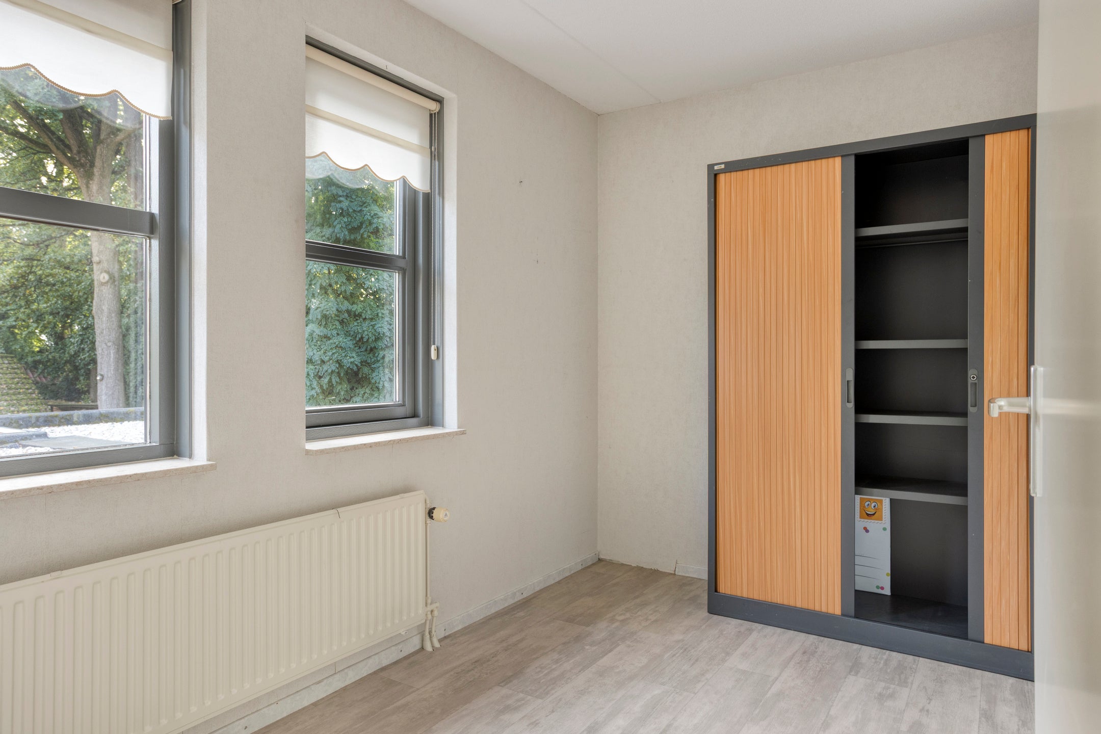 Tussenwoning te koop: Haagbeuklaan 5, Ede