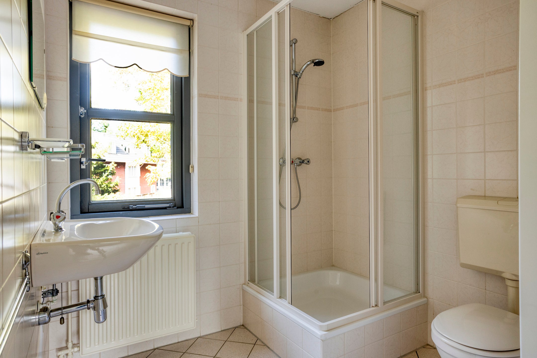 Tussenwoning te koop: Haagbeuklaan 5, Ede