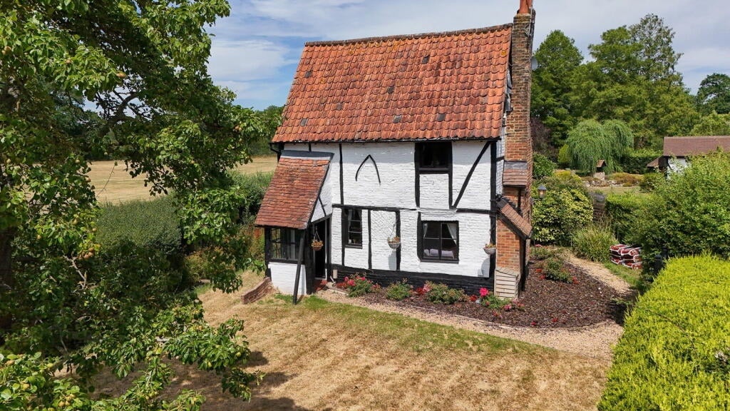 House Cross Oak Lane in Reigate and Banstead