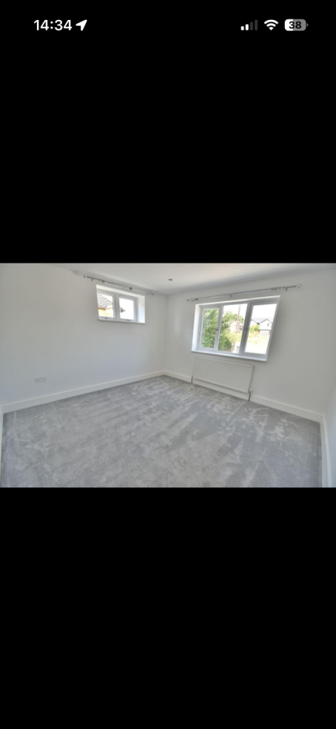 House New Road in Parley Cross