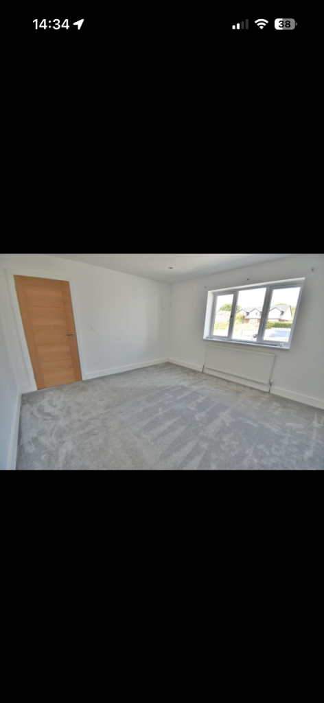 House New Road in Parley Cross