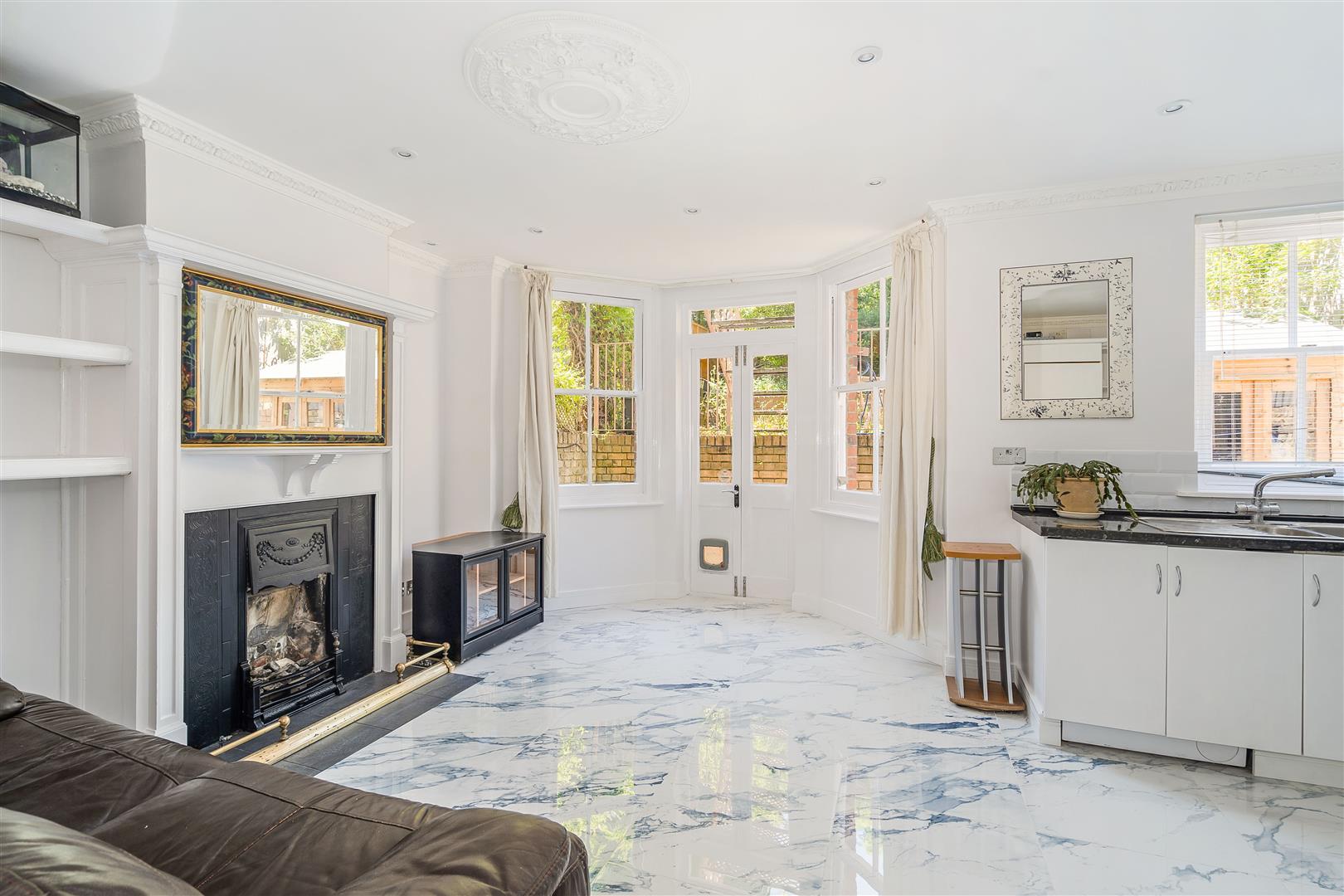 Flat Lammas Park Road in Greater London