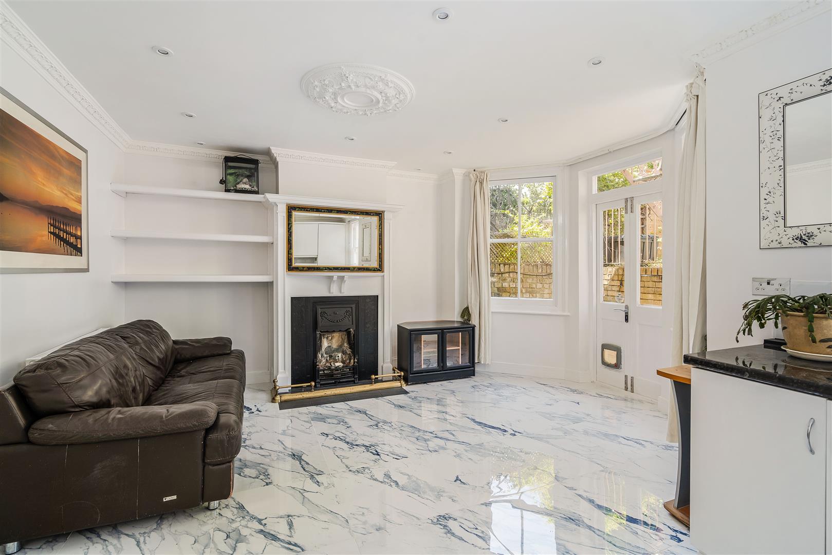 Flat Lammas Park Road in Greater London