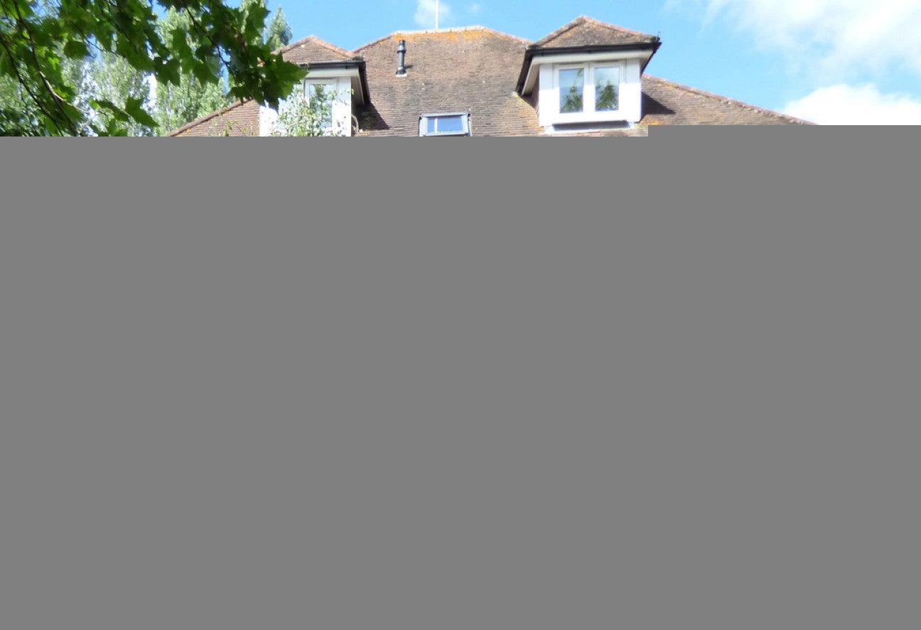 Flat Randalls Road in Mole Valley