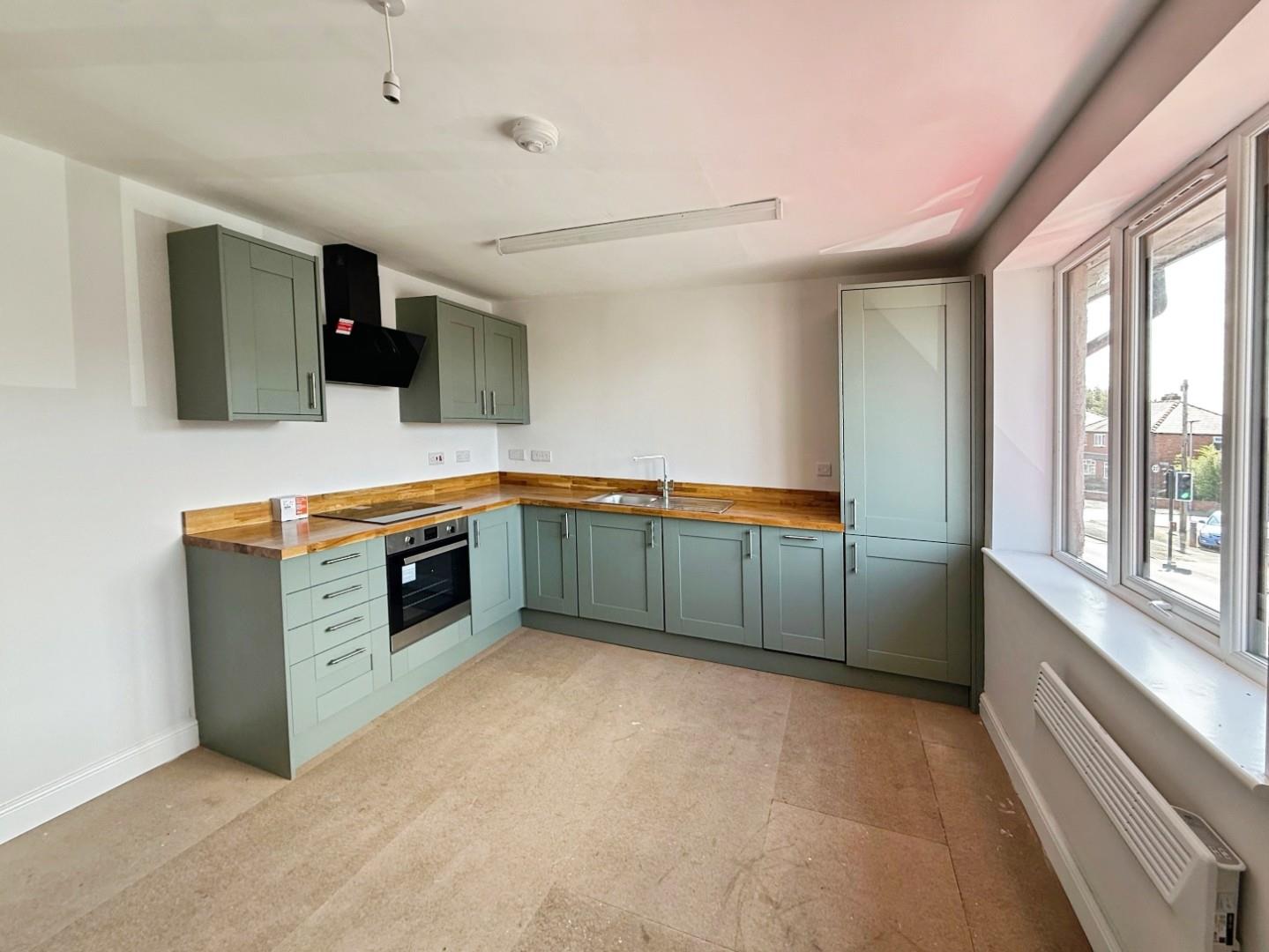 Flat Banks Court in Leigh