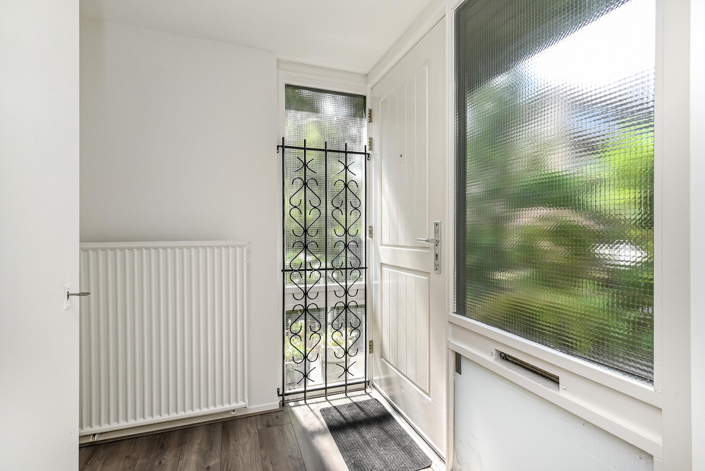 Tussenwoning te koop: Distelweide 145, Voorburg