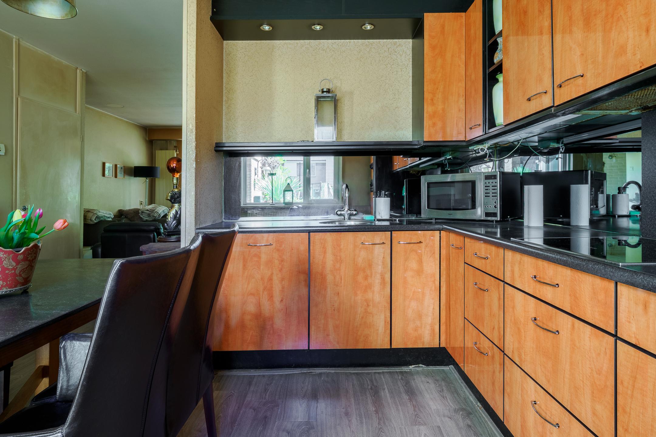 Tussenwoning te koop: Kemnalanden 27, Enschede