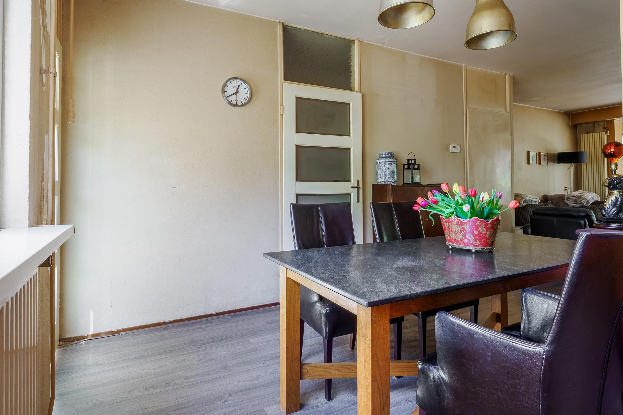 Tussenwoning te koop: Kemnalanden 27, Enschede